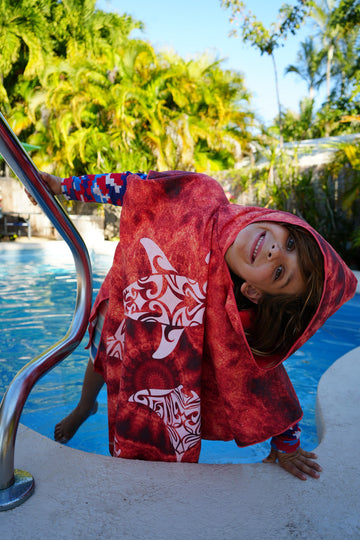 20 Recycled Plastic Bottles in Every Poncho — Here's Why That Matters