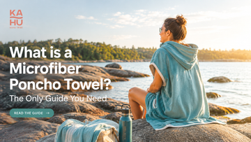Microfiber poncho towel at the beach — Kahu Tribe quick-dry beach poncho